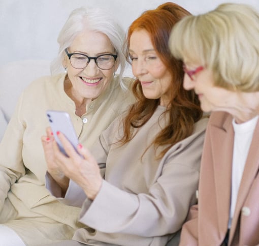 three women video chatting